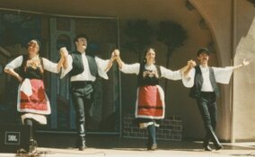 Greek dancers performing Syrtos at a festival